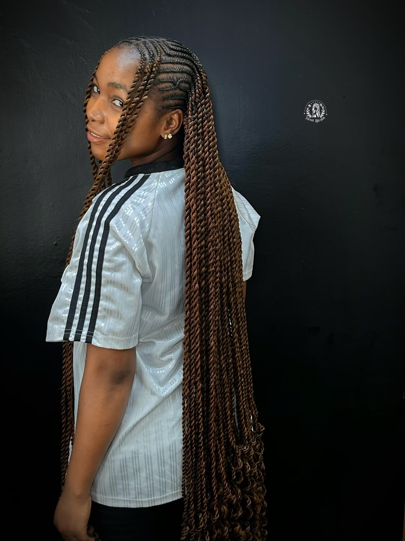 Long Senegal twists styled at Yadah Braids